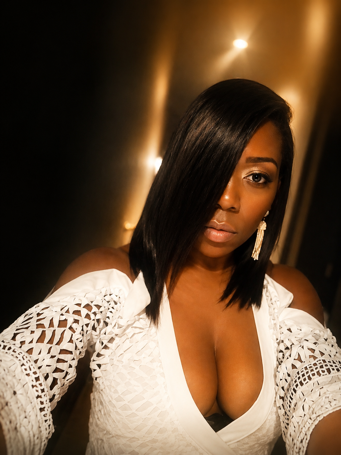 Hair Sanctuary client with sleek silk press bob