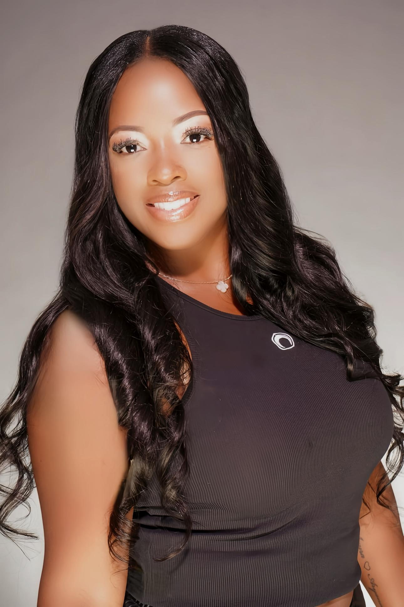 Hair Sanctuary gallery portrait with soft glossy curls
